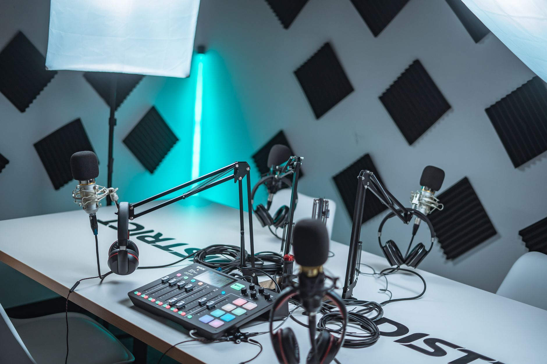 audio interface and condenser microphone on studio desk