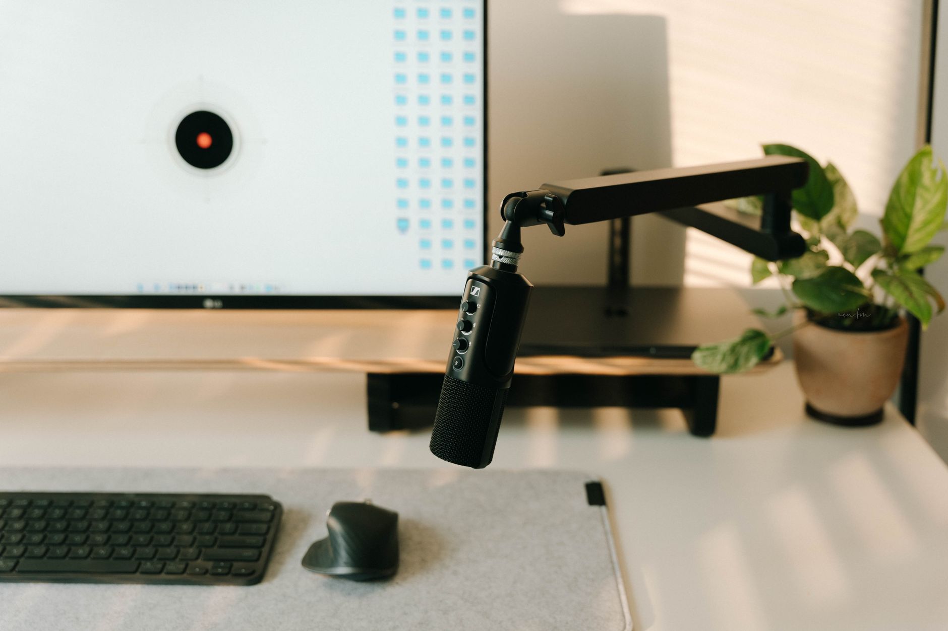 condenser microphone on desk home studio setup