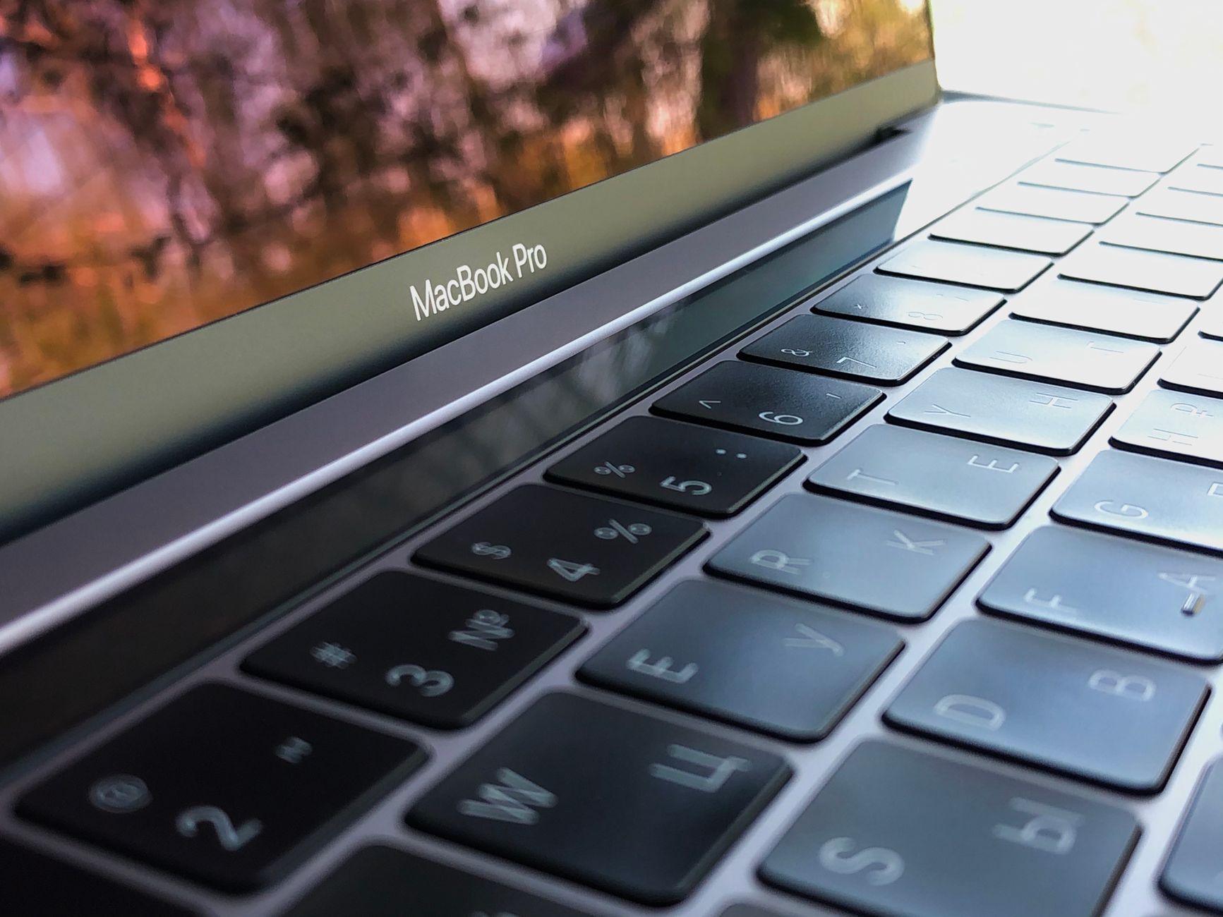 macbook with garageband open on studio desk