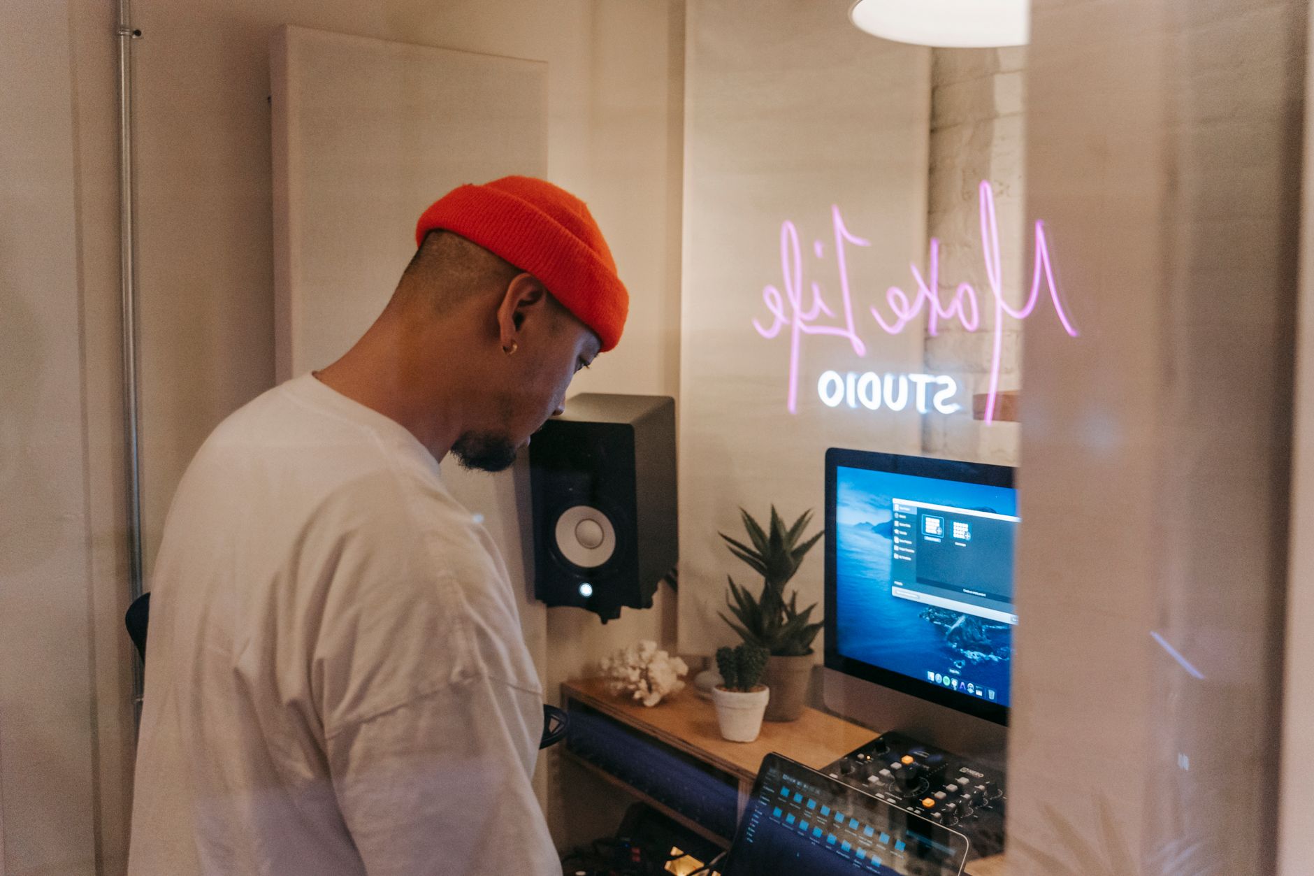 small studio monitor pair on desktop recording setup