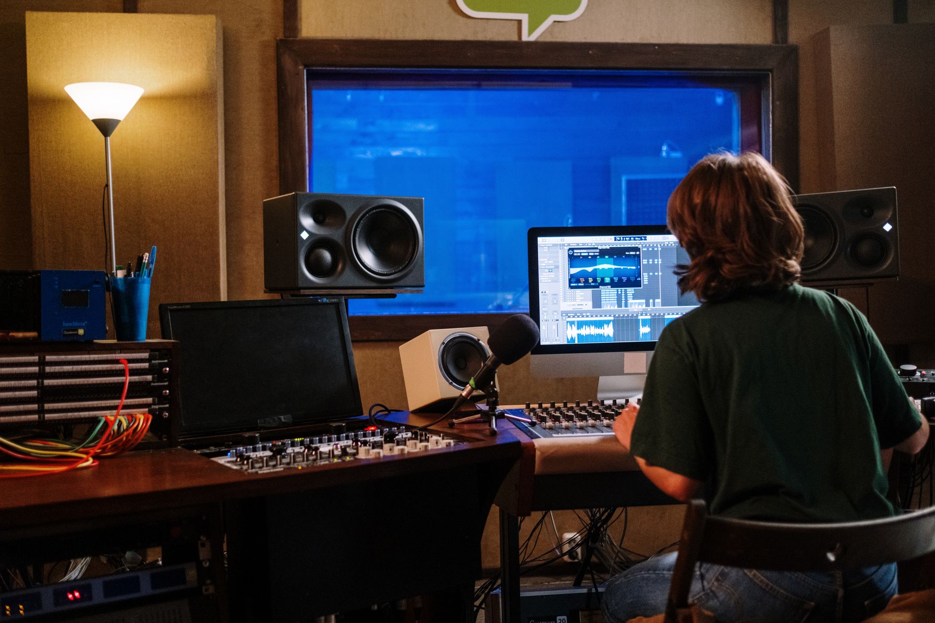 nearfield studio monitors on mixing desk